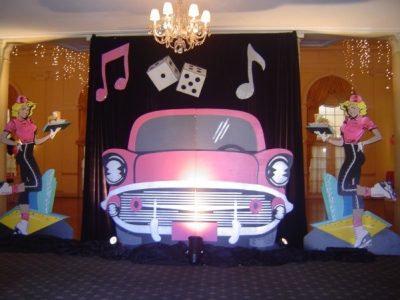car profile with dice and music notes